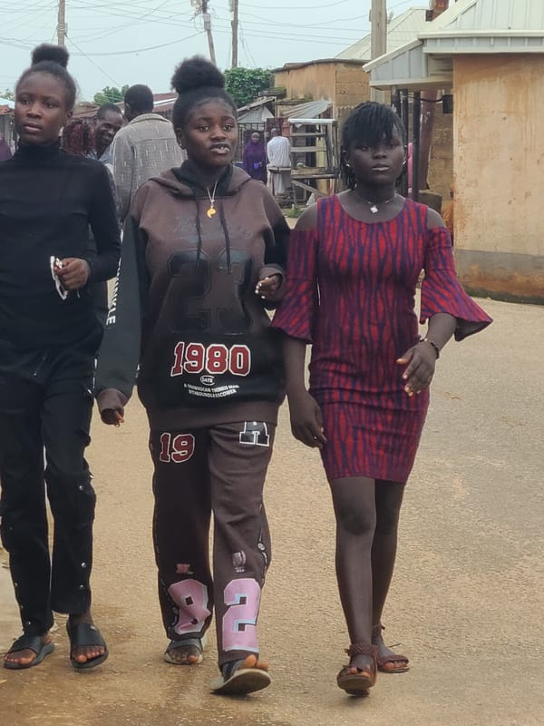 Everyday street life across Jos neighborhoods on a June afternoon