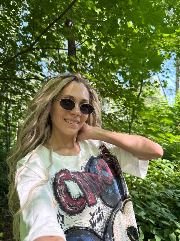 Woman takes selfie in Russian forest setting
