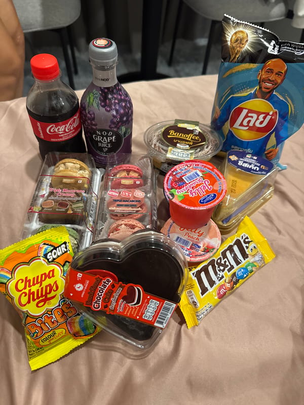 Snack spread documented in Kathu, Thailand hotel room