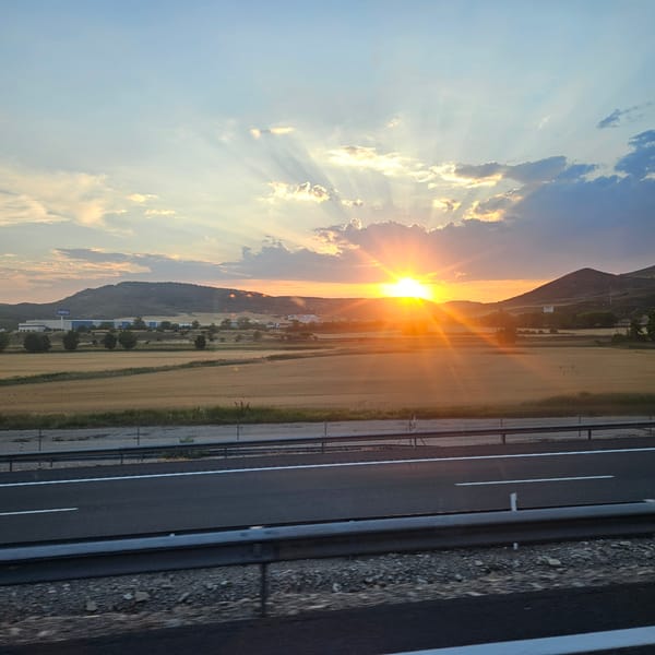 Rays fan out over the Castilian countryside at sunset