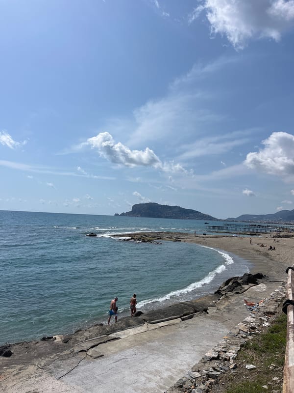 Beachgoers gather along Alanya shoreline on spring morning