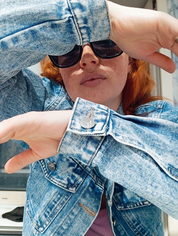 Woman takes selfies indoors in Yurgamysh, Russia