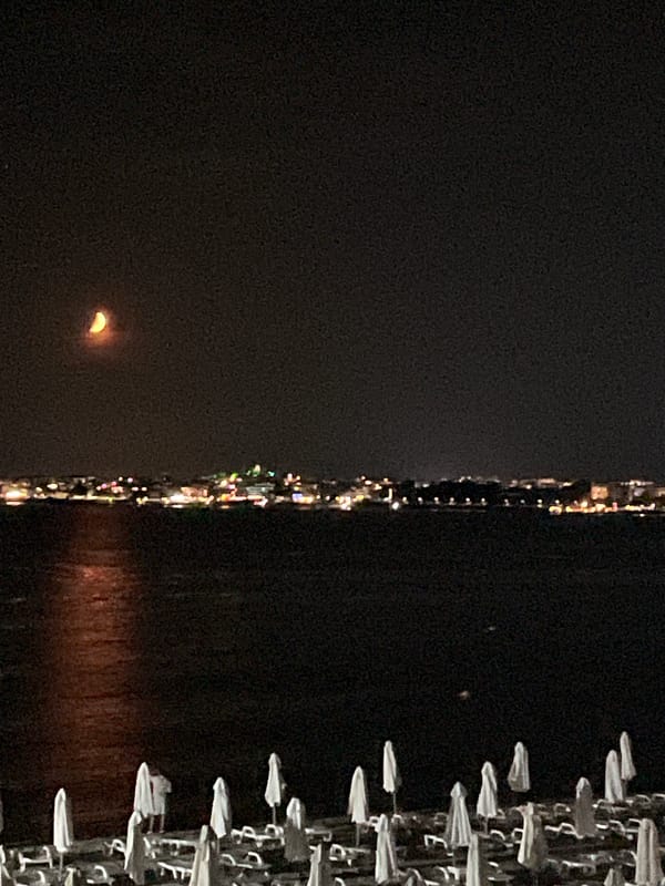Crescent moon over a calm summer night in Nesebar