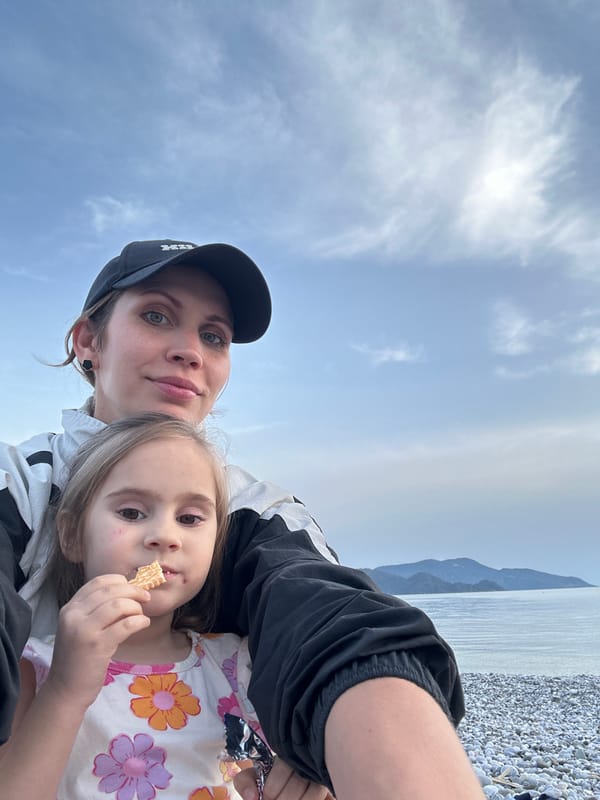 Woman and child enjoy beach outing in Fethiye