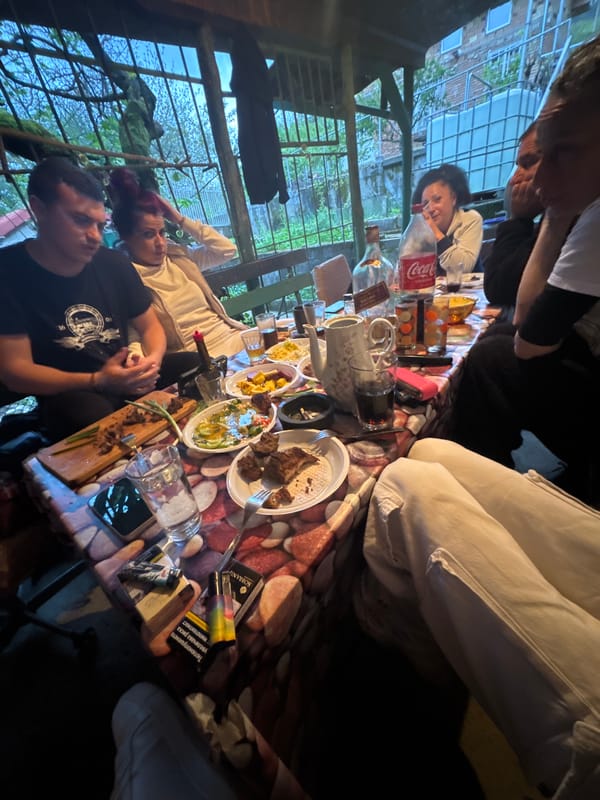 Friends gather for outdoor meal in Karlovo, Bulgaria