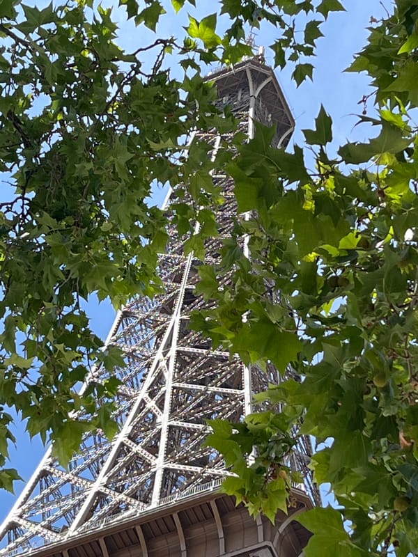 Up-close with the Eiffel Tower on a sunny afternoon