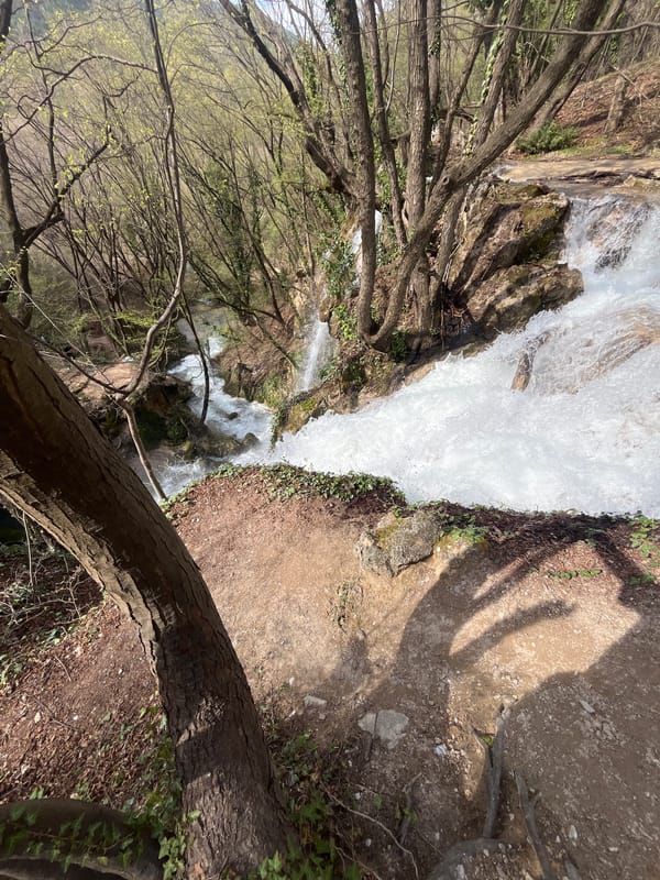 Waterfall captured flowing through forest near Bachkovo, Bulgaria