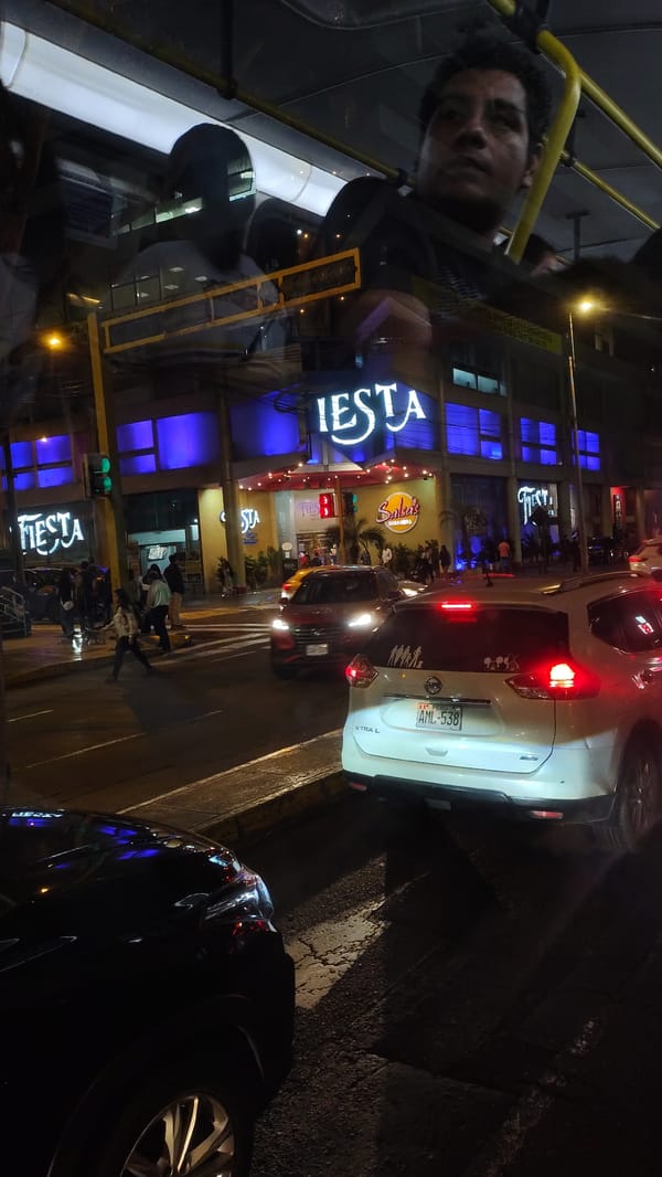 Nighttime vehicle reflection captured in Miraflores, Peru