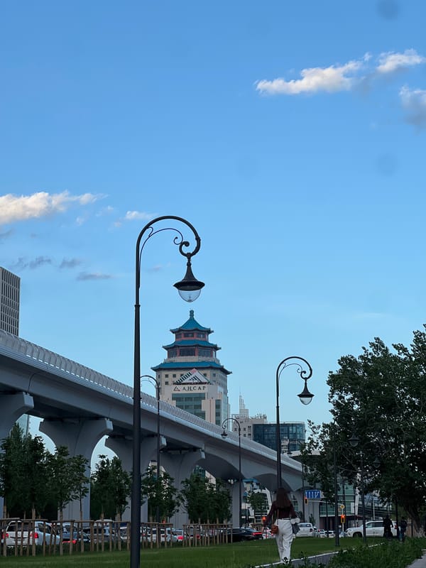 Witness documents Astana cityscape during afternoon walk