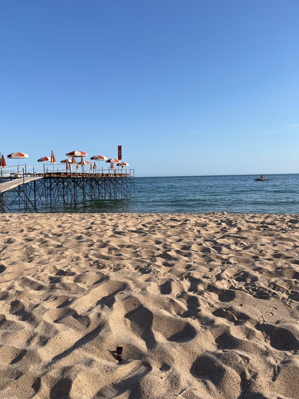 Lazy afternoon on the Cannes beach, drinks and sunshine
