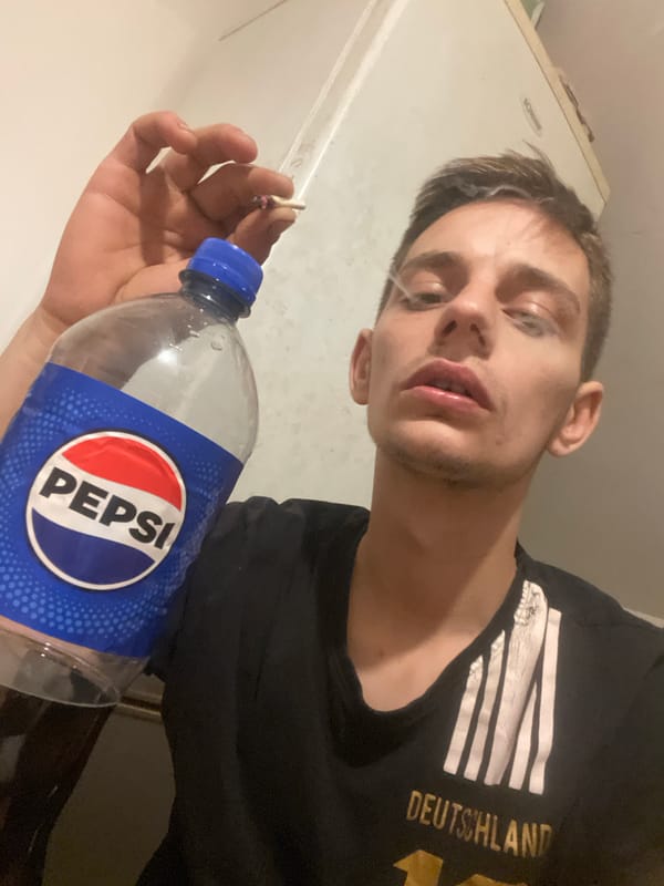 Indoor drinking and smoking session with Deutschland shirt