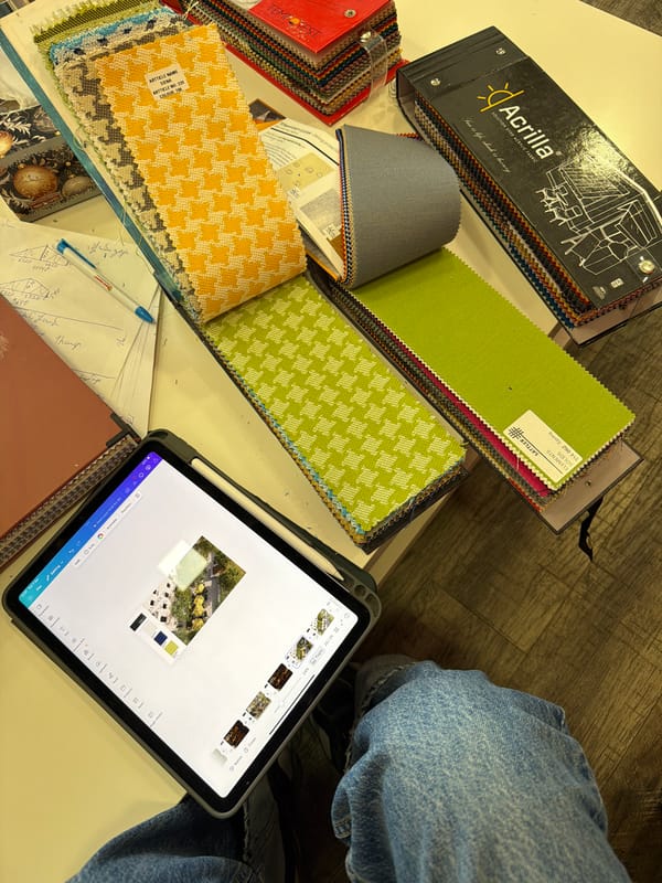 Design materials and fabric swatches documented in Yerevan workspace