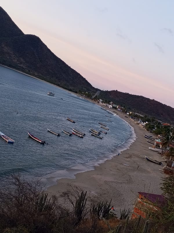 Coastal sunset observed over mountainous horizon April 21