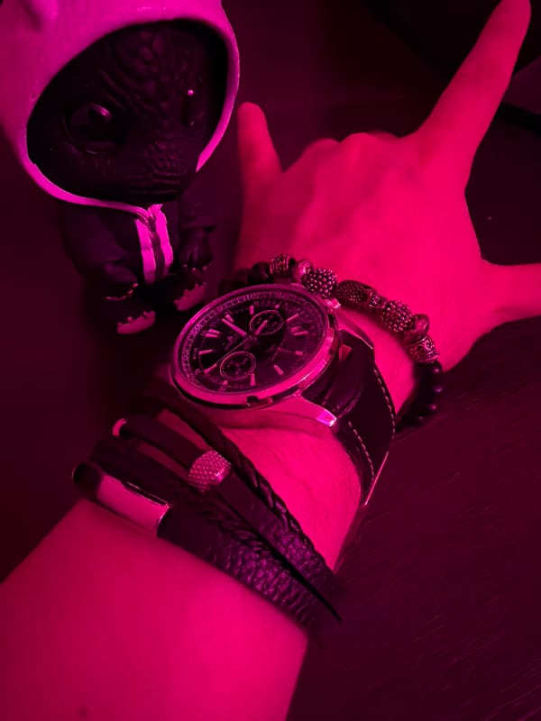 Neon-lit wrist check: leather bracelet and chronograph in Yekaterinburg