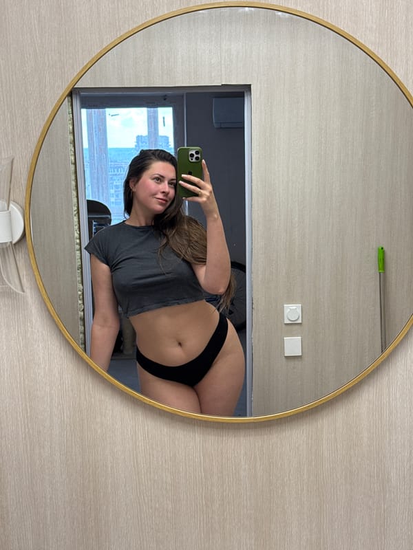 Woman takes series of mirror selfies across multiple rooms