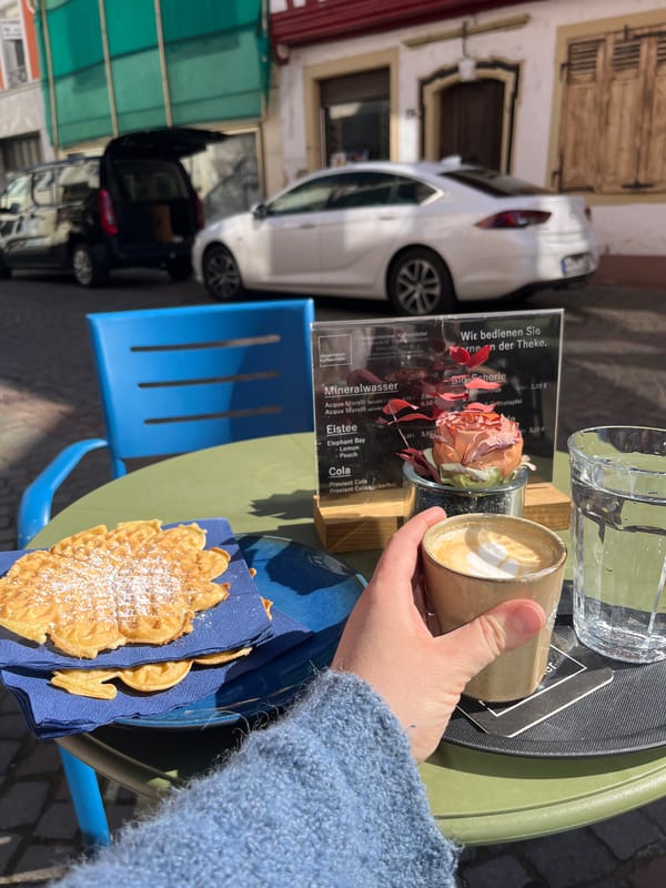 Morning coffee moment captured at Meisenheim outdoor cafe