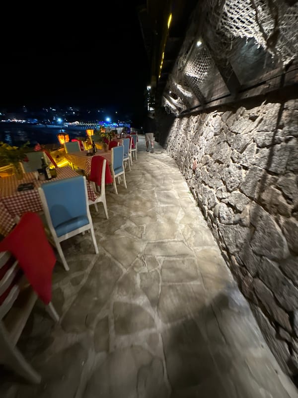 Evening coastal town exploration with dining and historic sites