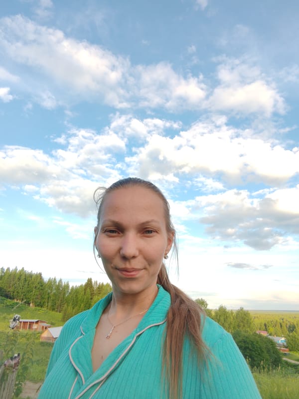 Summer evening in a Russian village, flowers, selfies, and golden-hour skies