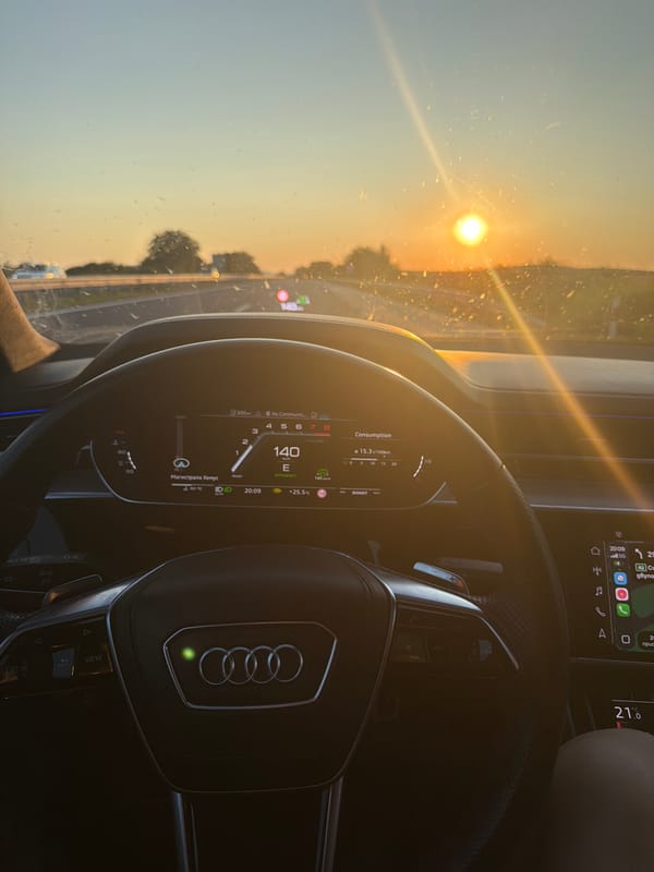 Sunset drive through rural Bulgaria, golden light across the windshield.