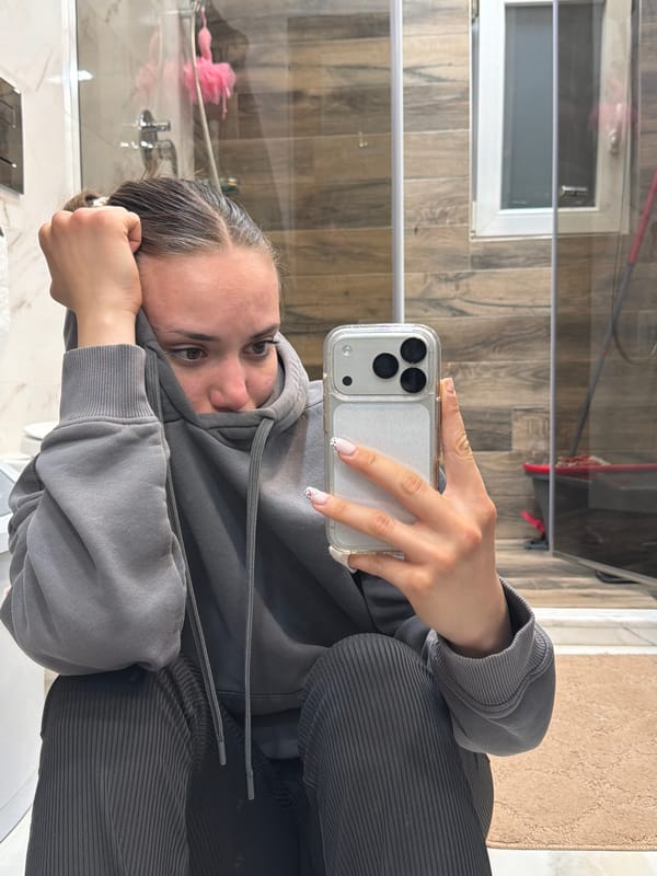 Woman takes bathroom selfie in Buhovo, Bulgaria