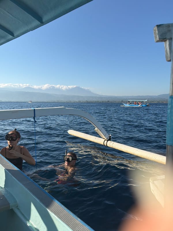 Snorkeling and prahu boats off the Seririt coast