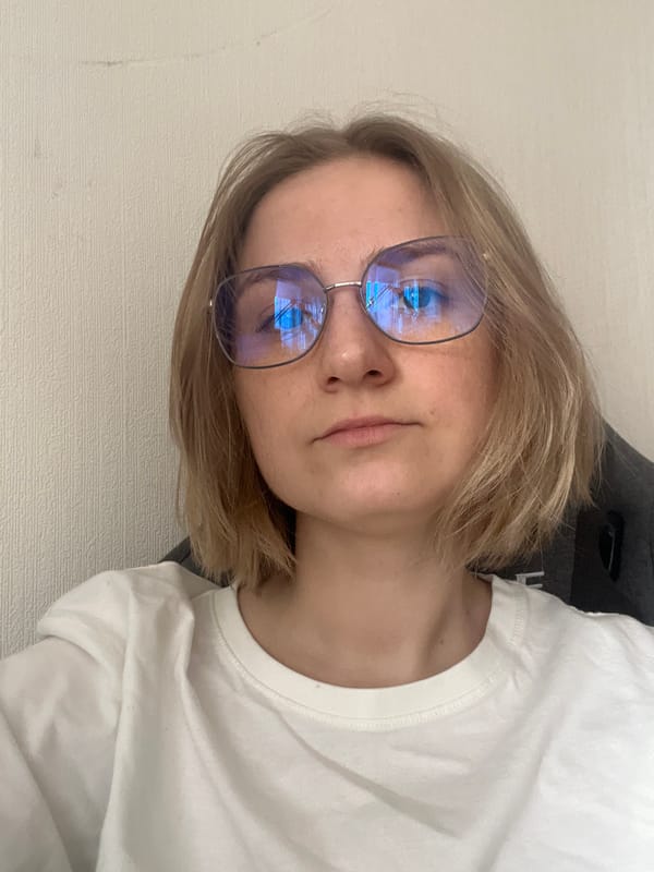 Person in glasses spotted in indoor setting in Novosibirsk