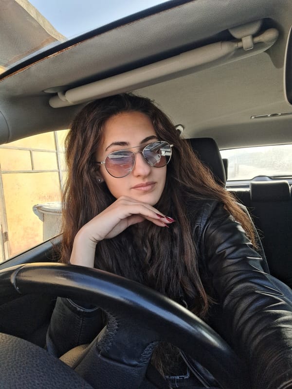 Woman photographed in car during daylight in Chepintsi, Bulgaria