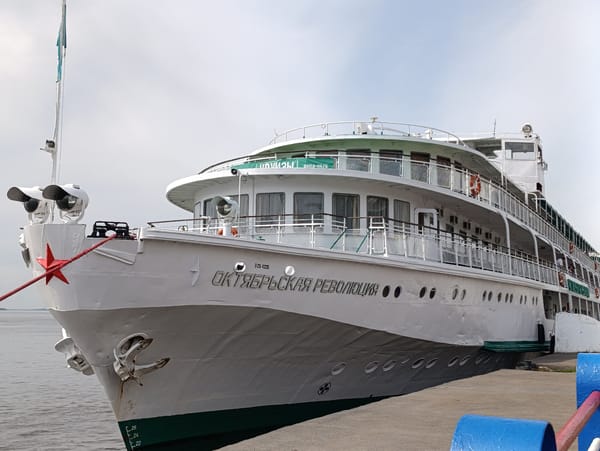 Woman poses for photos near cruise ship in Saratov