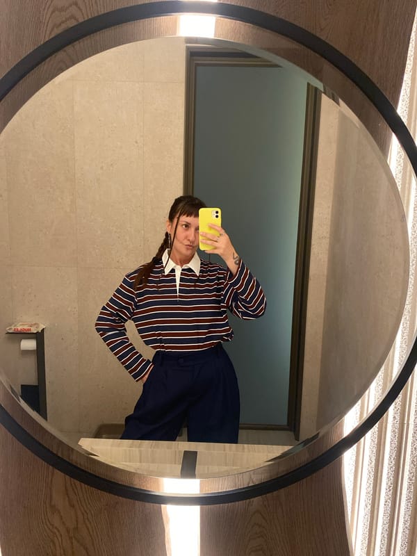 Bathroom selfies and a sushi spread on a patio in Izhevsk
