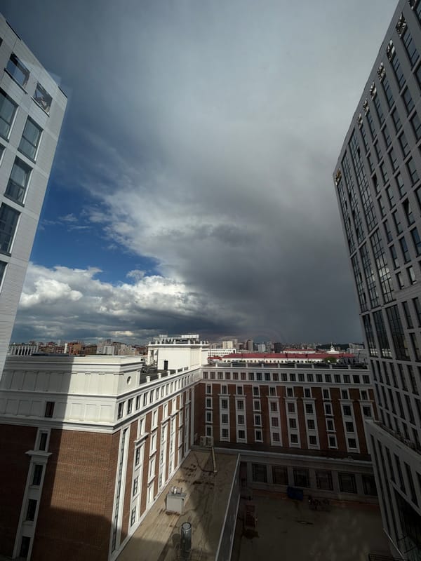 Ufa skyline: modern towers under a dramatic summer sky