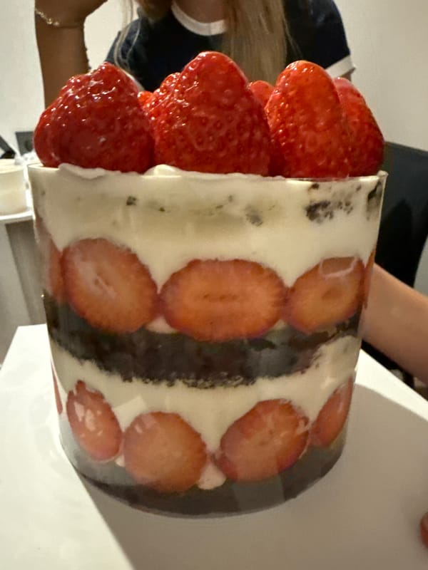 Rainy night market scenes and local food captured in Busan