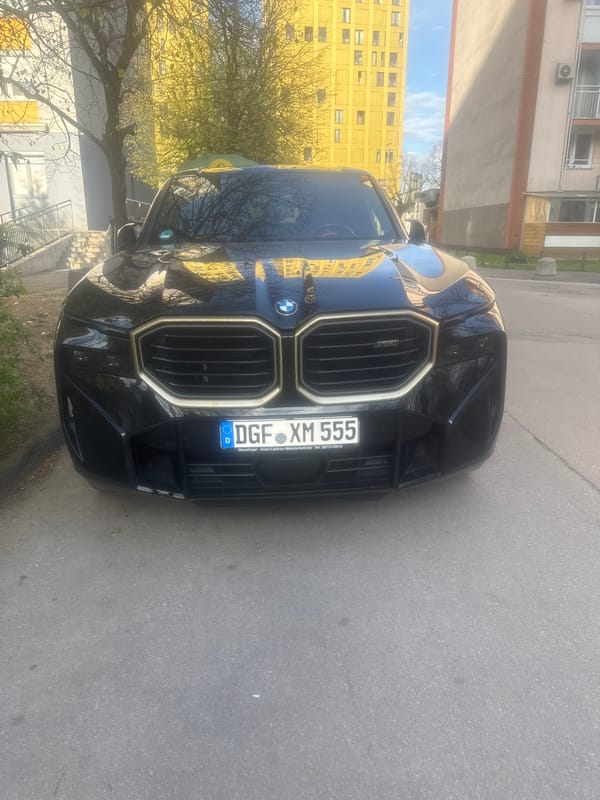 Spring magnolia blooms and luxury car spotted in Ljubljana