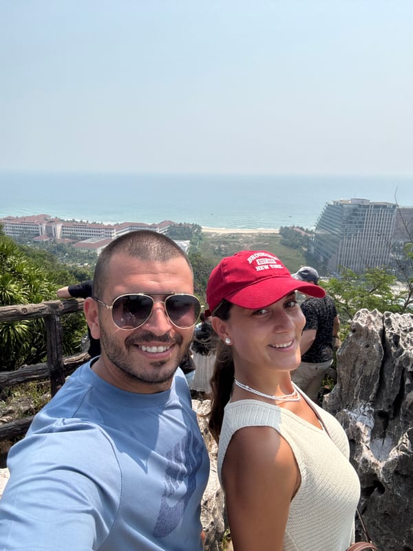 Person stands on rocky outcrop in Đà Nẵng