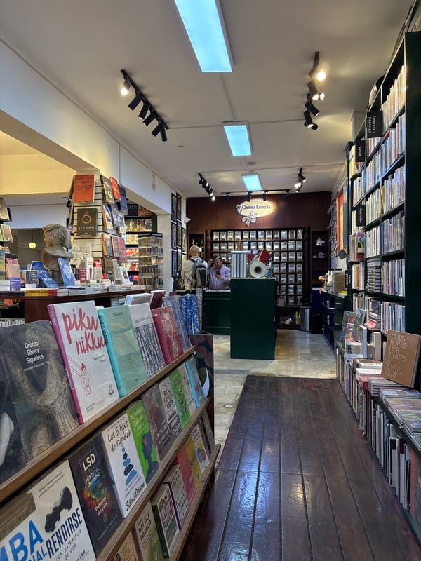 Inside a San Isidro bookstore with a striking metal sculpture