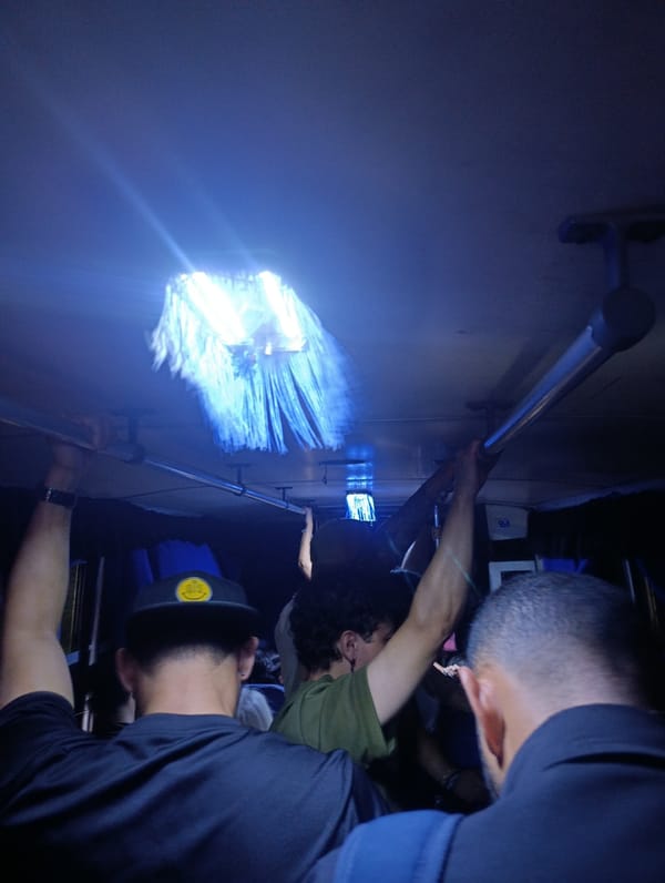 Late night bus passengers photographed in Juan Griego, Venezuela