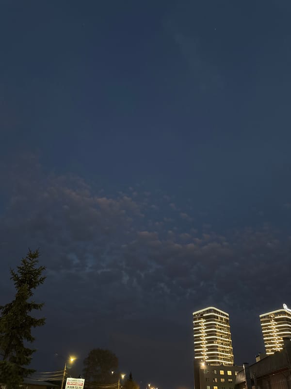 Evening photos capture illuminated modern buildings in Krasnoyarsk
