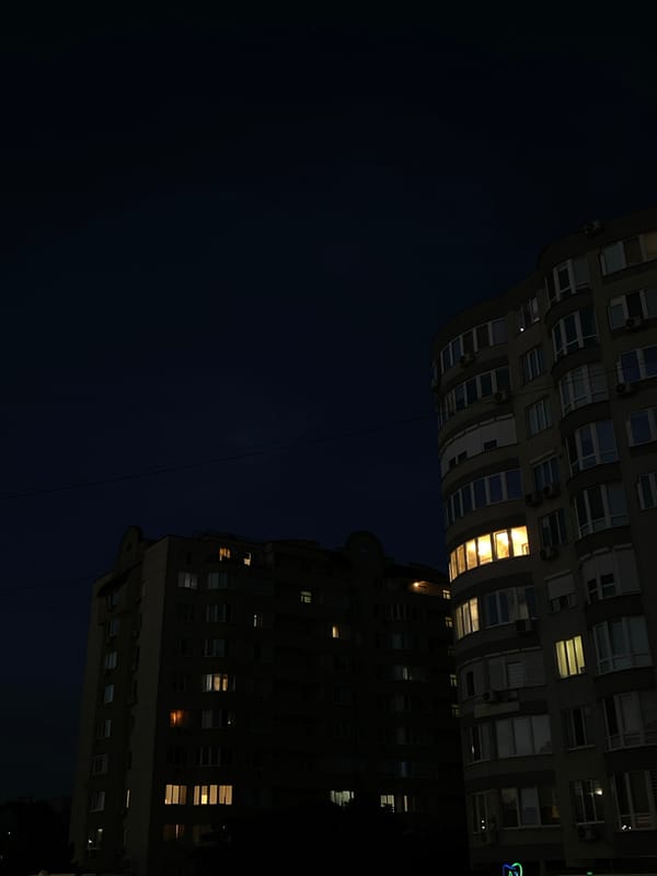 Chișinău after dark: streets, apartment blocks, and blue-lit underpass