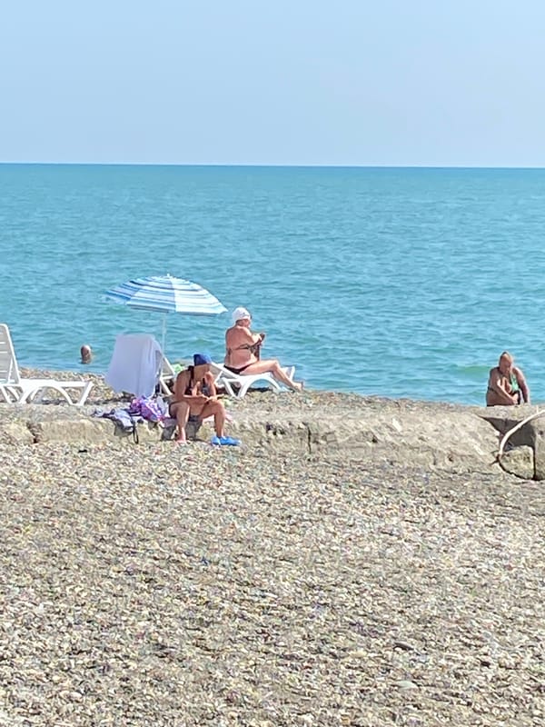 Pebble beach and park strolls on a summer afternoon in Abkhazia