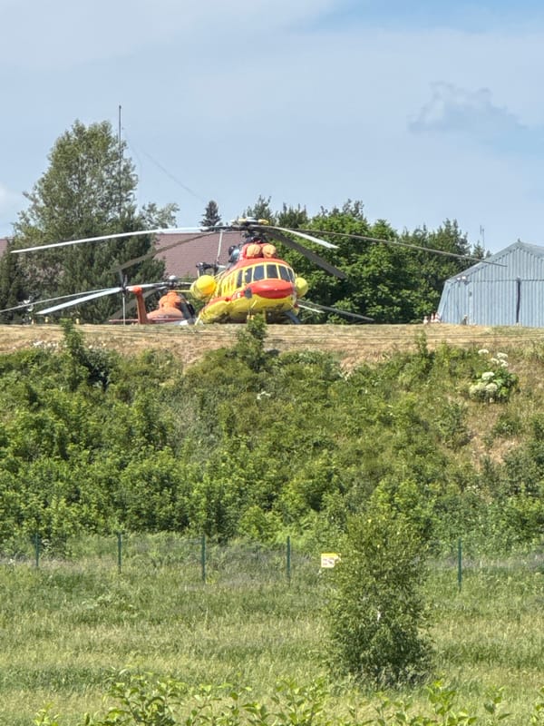 Medical-type helicopter grounded near Gorno-Altaysk Airport, Siberia