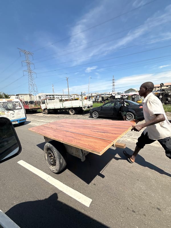 Midday street activity in Igboefon, Lagos, Nigeria