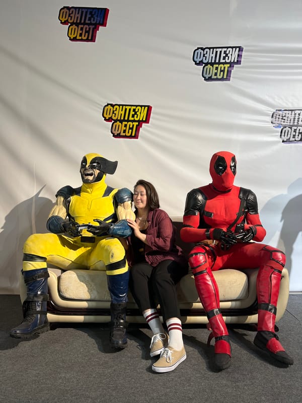 Marvel cosplay photo op and handheld gaming, same afternoon