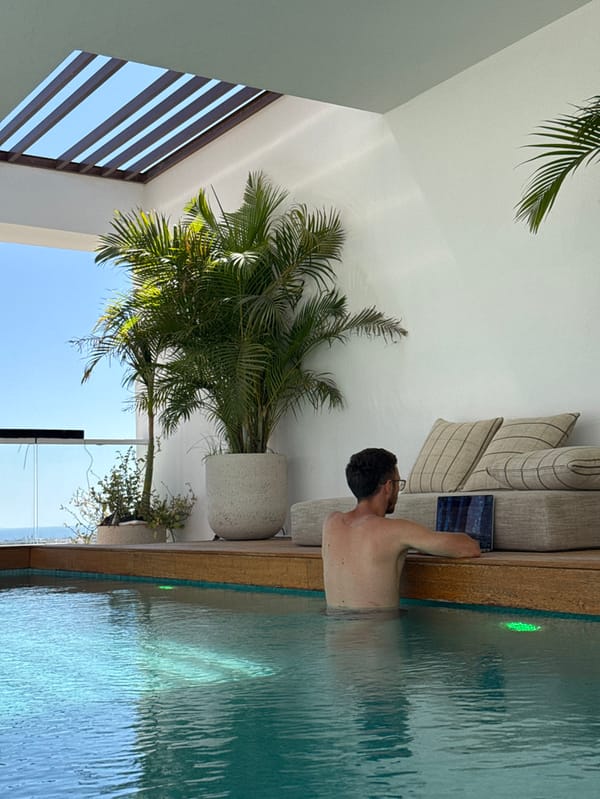 Couple enjoys rooftop pool time in Eilat resort area