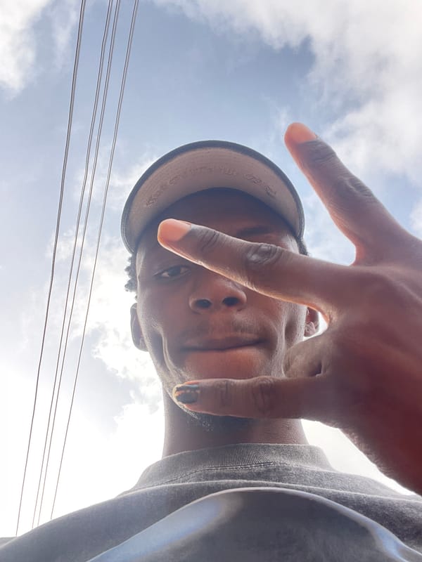 Young man photographed multiple times in Lokoja, Nigeria
