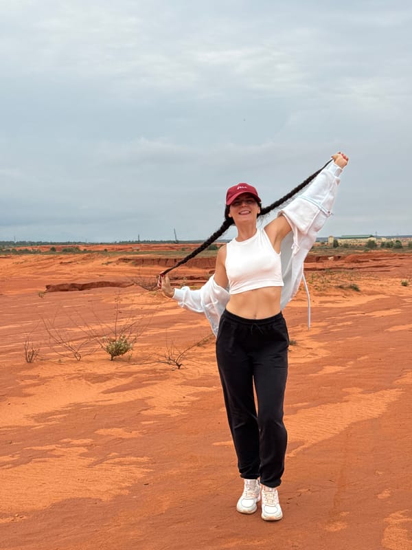 Posing and playing on Mui Ne's red sand dunes