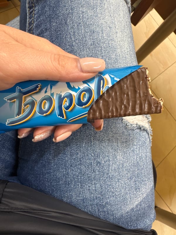 Person enjoys Tono chocolate wafer bar in Plovdiv