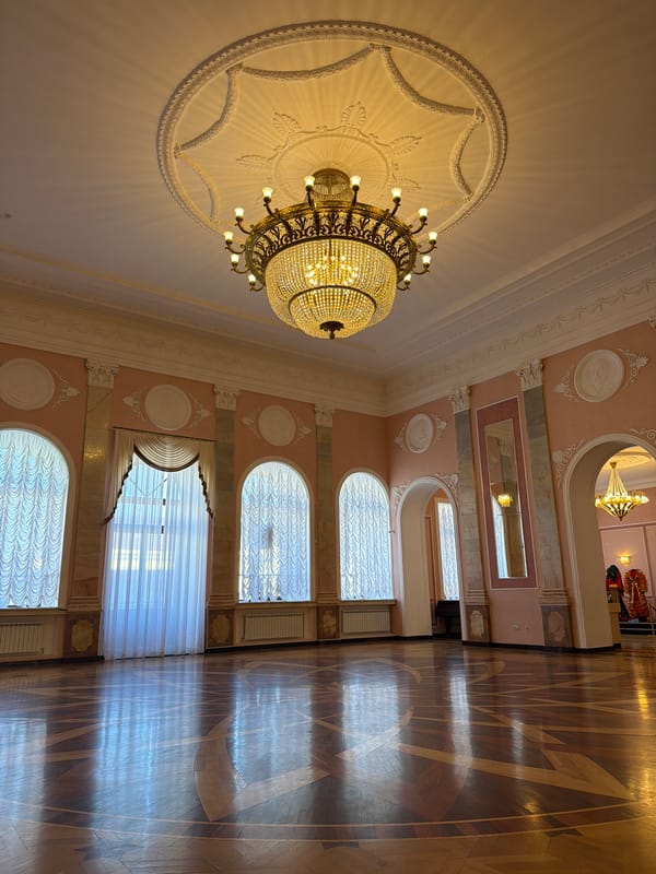 Ornate chandeliers and grand interiors of a Ufa venue