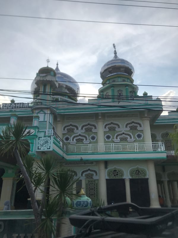 Mosque with gray domes documented in Langsa, Indonesia