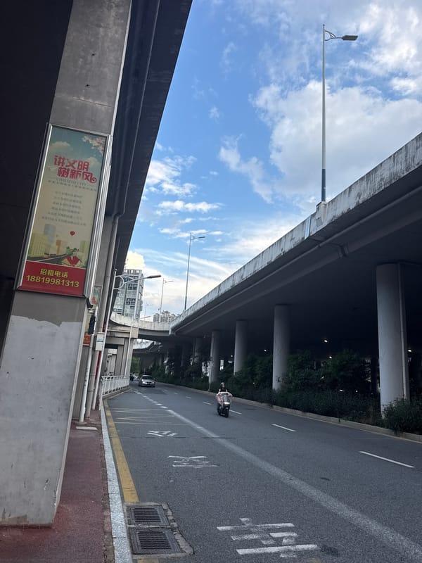 Street life and infrastructure around Huizhou on a July morning