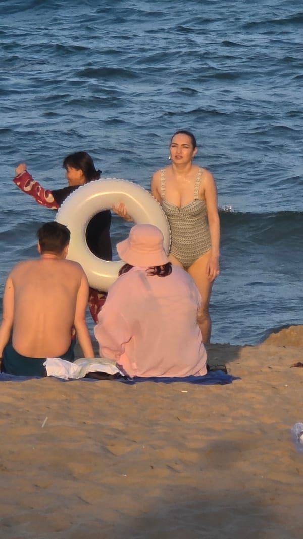 Morning scenes of traffic, beachgoers, buildings captured in Nha Trang