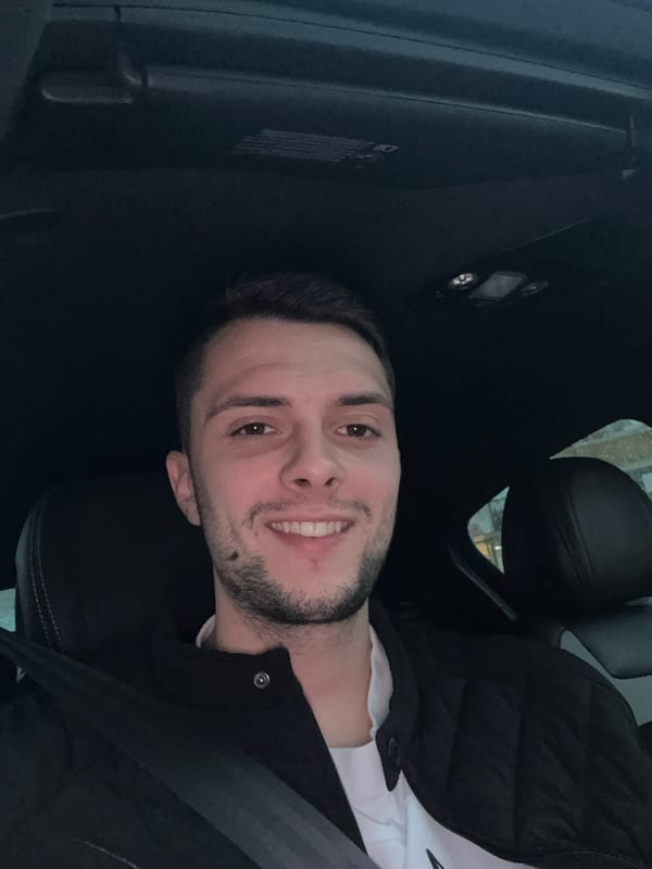 Man photographed smiling in driver's seat in Bulgaria